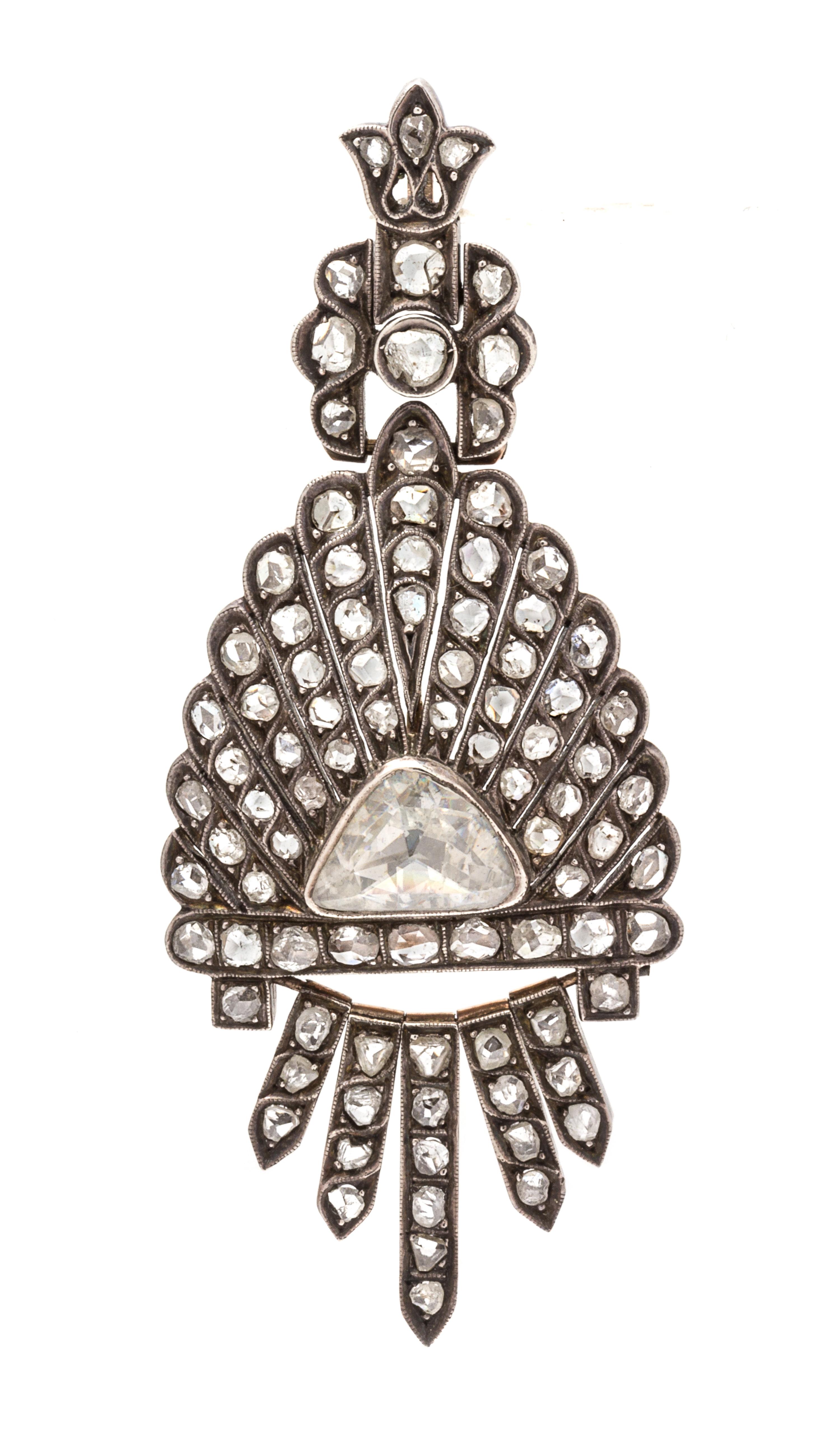A Silver Topped Gold and Diamond Fringe Pendant, 7.50 dwts.