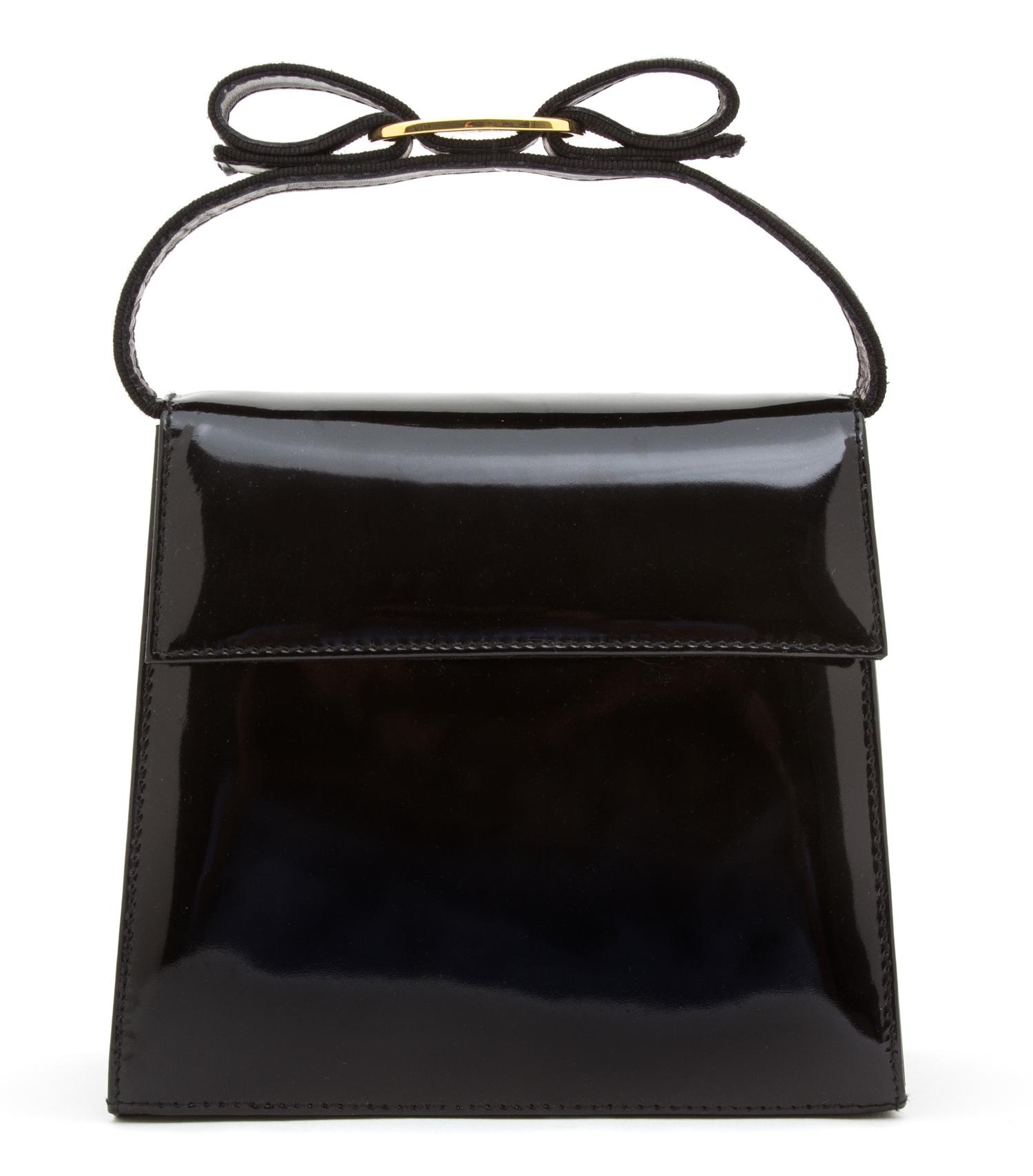 A Ferragamo Vara Bow Black Patent Two Way Handbag, 6" x 6.5" x 2.75".
