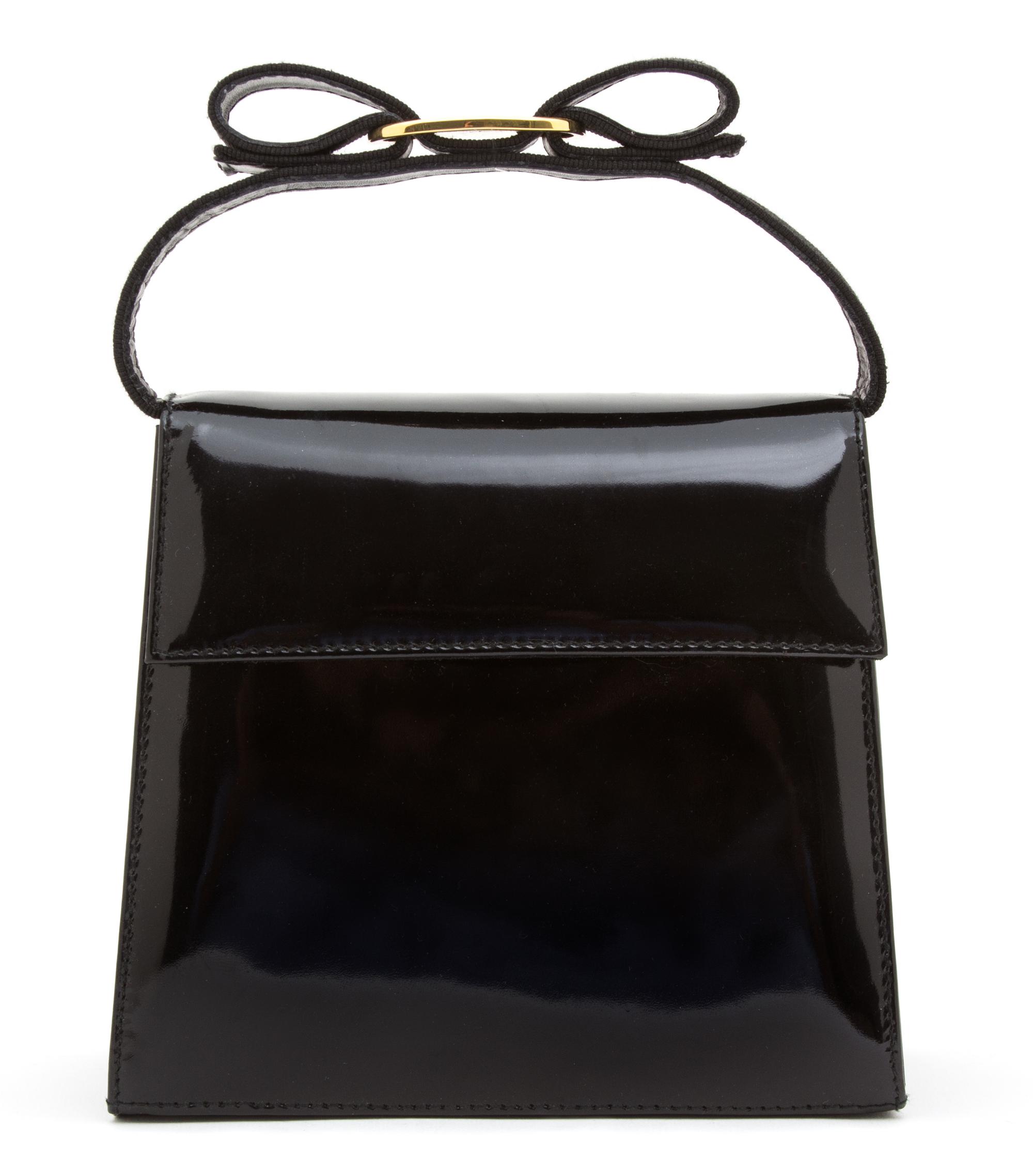 A Ferragamo Vara Bow Black Patent Two Way Handbag, 6" x 6.5" x 2.75".