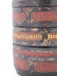 A Chinese Lacquered and Partial Gilt Two Tiered Basket
