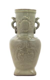 A Chinese Archaistic Celadon Glazed Molded Porcelain Vase 18TH CENTURY Height 11 1/2 inches. — 18TH CENTURY