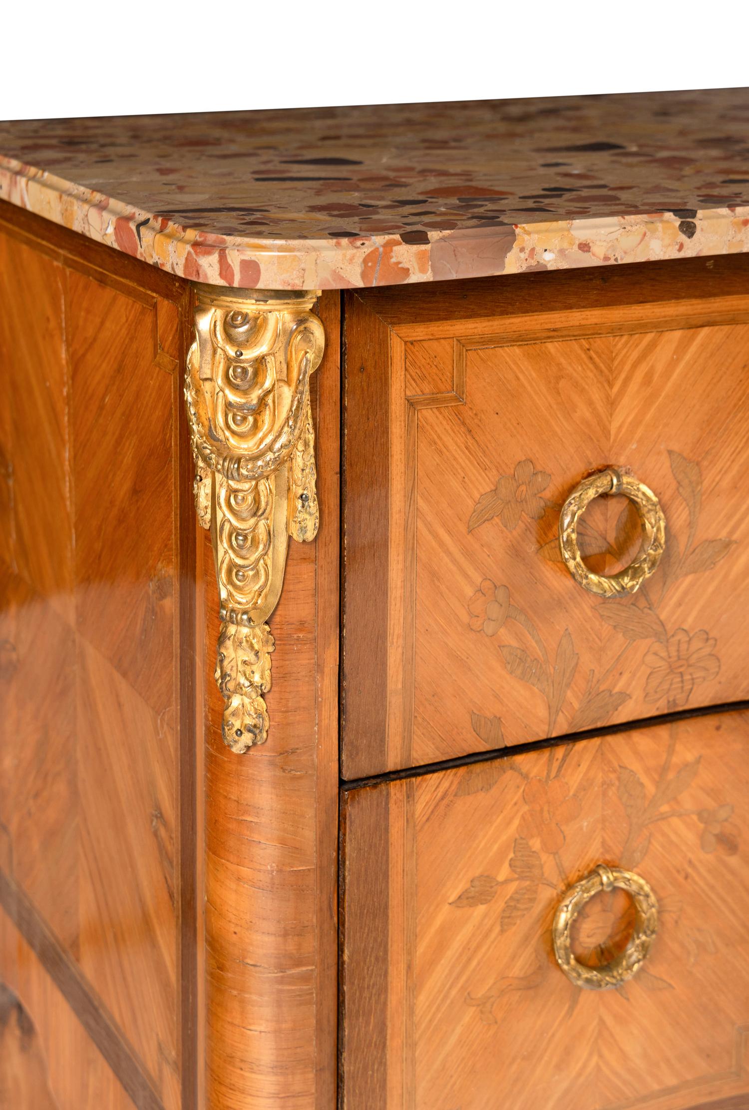 A Louis XV/XVI Transitional Style Marquetry Marble-Top Commode