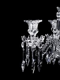 A Set of Three Baccarat Molded Glass Five-Light Candelabra