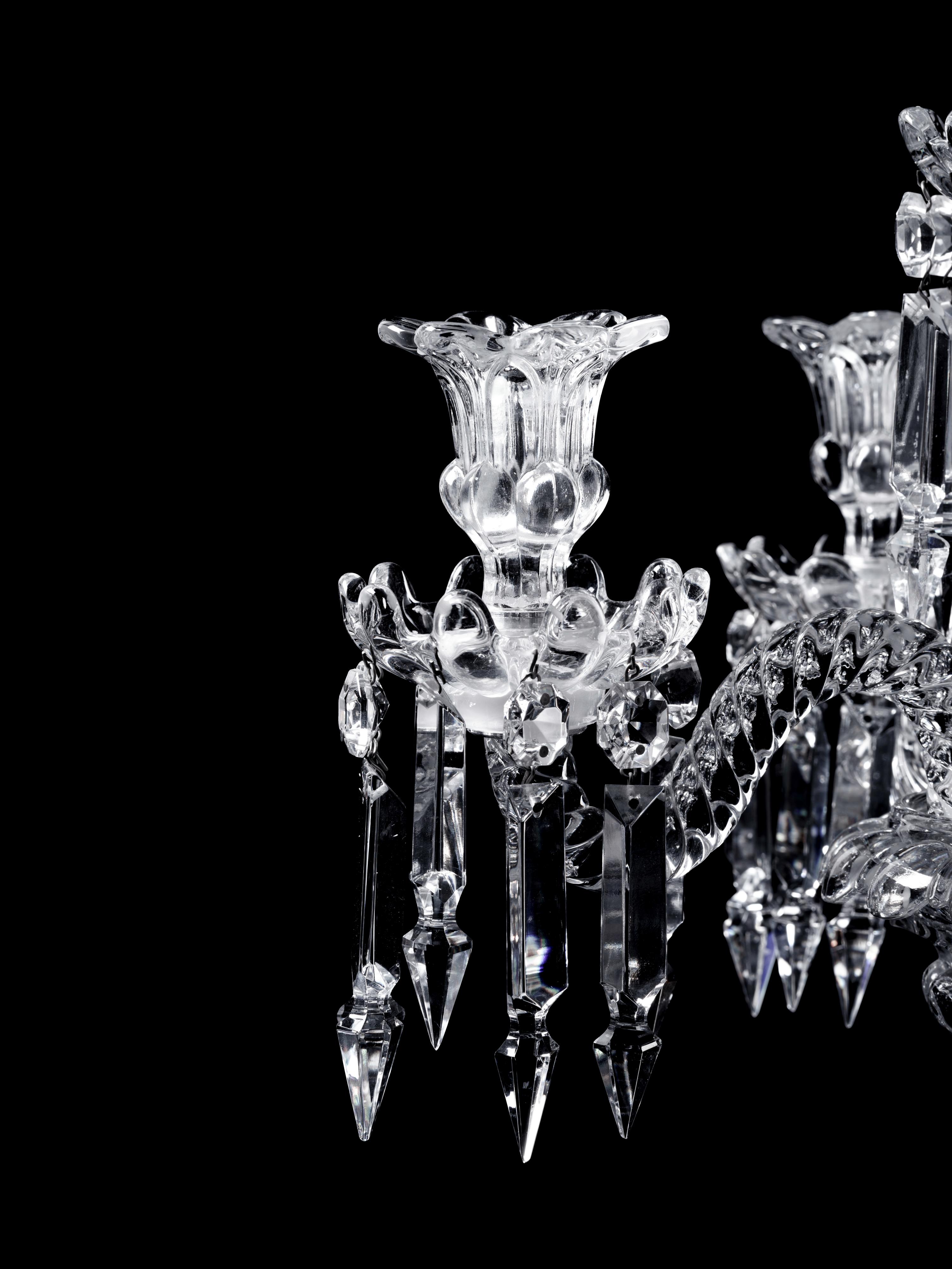 A Set of Three Baccarat Molded Glass Five-Light Candelabra