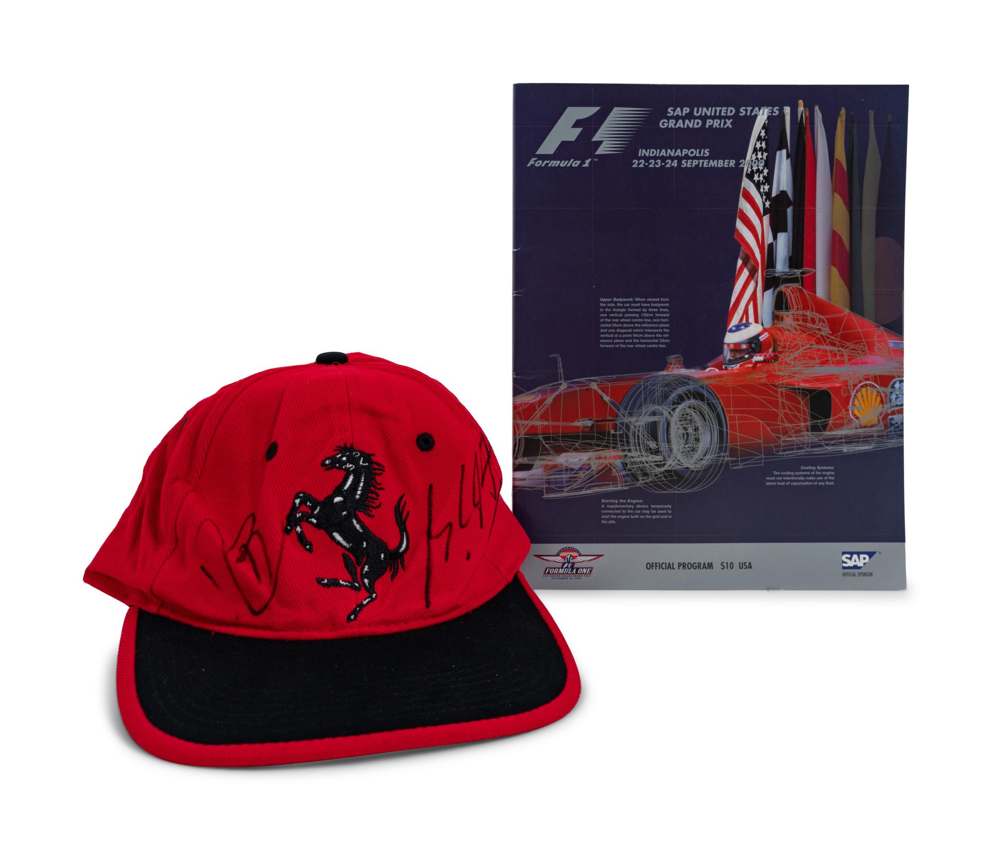 A Michael Schumacher Signed Autograph Ferrari Hat and Unsigned 2000 Indianapolis Formula 1 SAP United States Grand Prix Event Program,