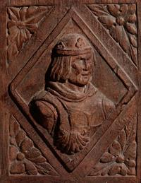 A Continental Terra Cotta Panel Cast from a Cabinet Door