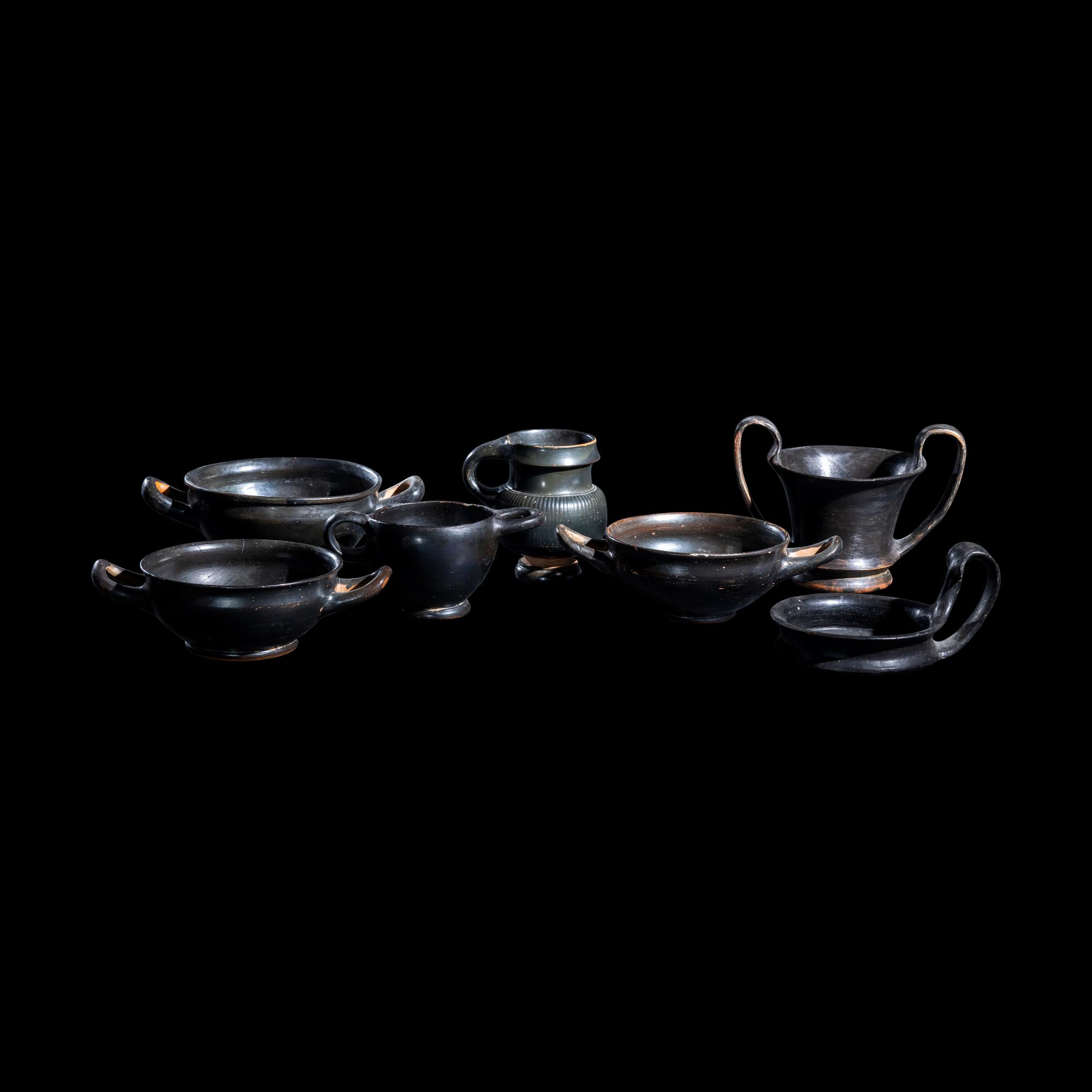 A Group of 7 Greek Black-Glazed Vessels