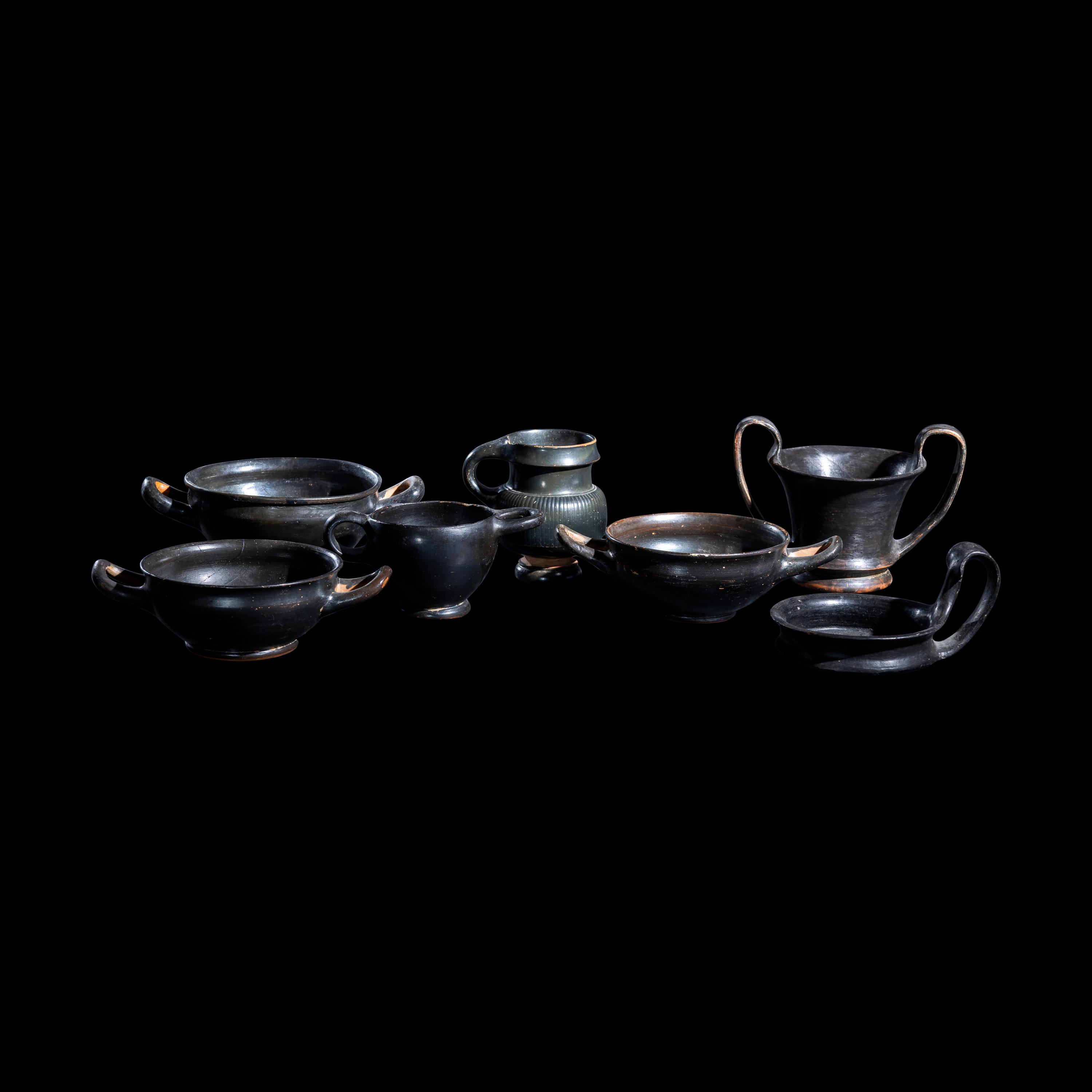 A Group of 7 Greek Black-Glazed Vessels