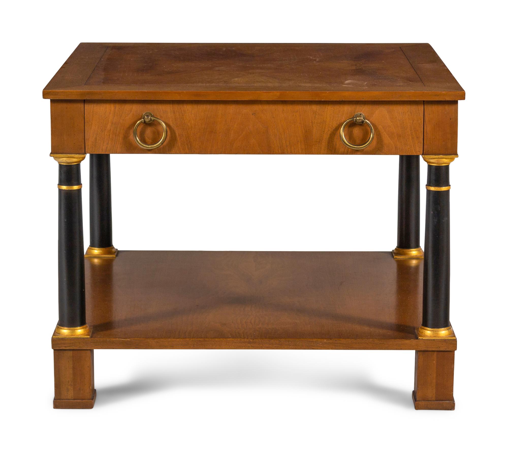 A Baker Walnut Side Table with Gilt and Ebonized Supports