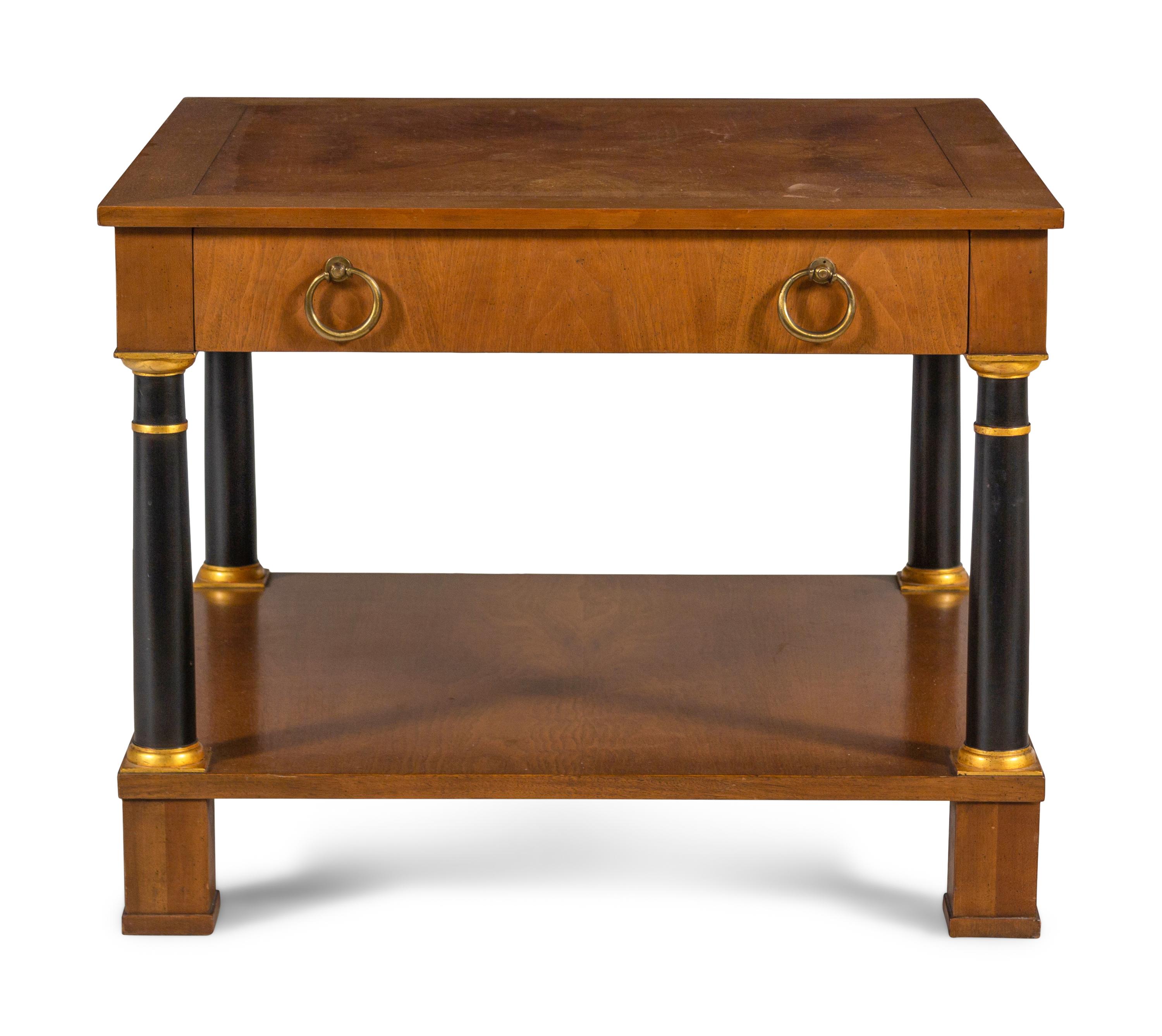 A Baker Walnut Side Table with Gilt and Ebonized Supports