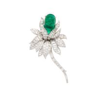 DAVID WEBB, EMERALD, DIAMOND, AND PLATINUM FLOWER BROOCH