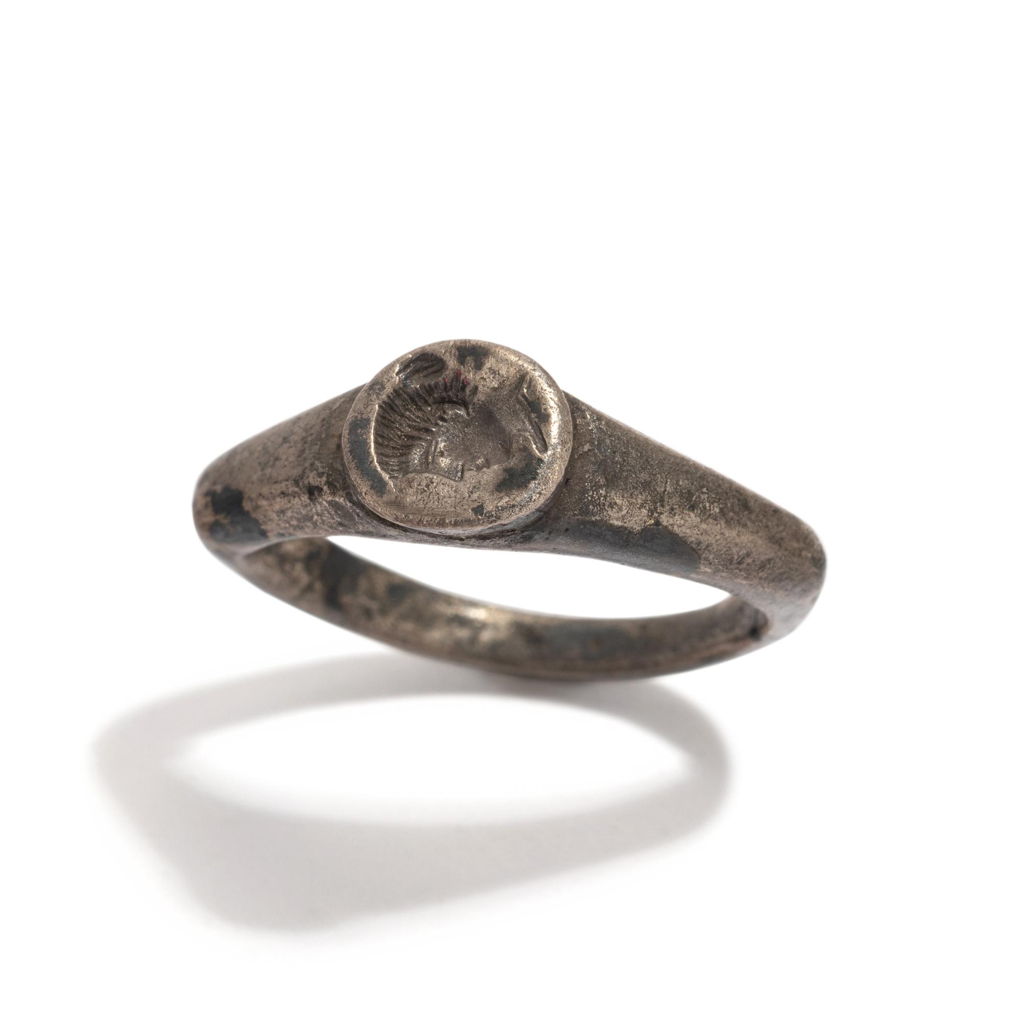 A Roman Silver Finger Ring with a Portrait Bust of a Woman
