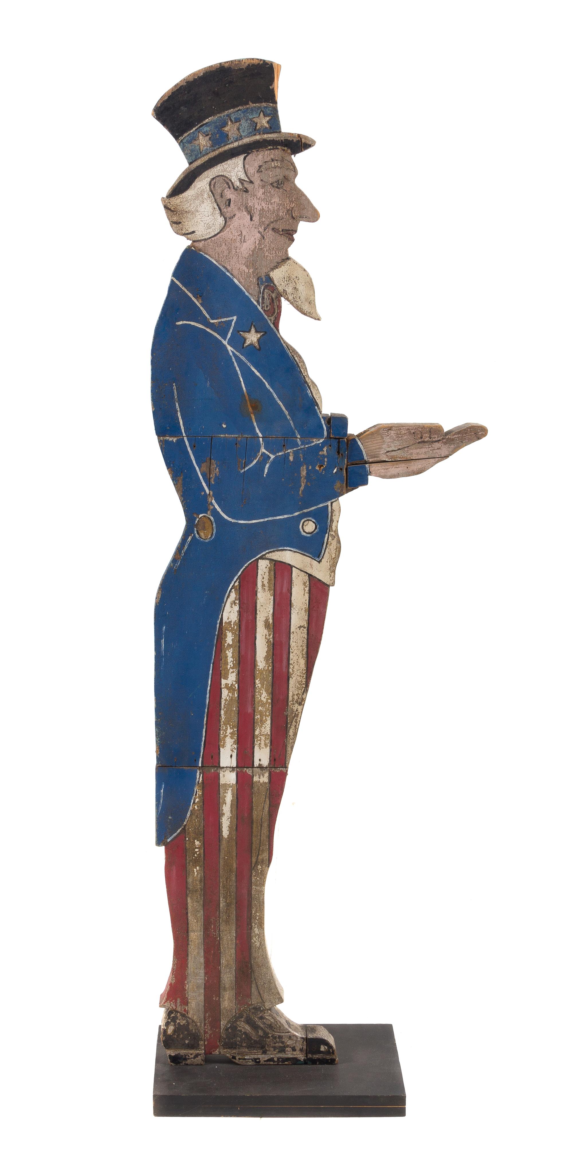A Standing "Uncle Sam" Tip Tray Height 61 3/4 inches. — Mid 20th Century