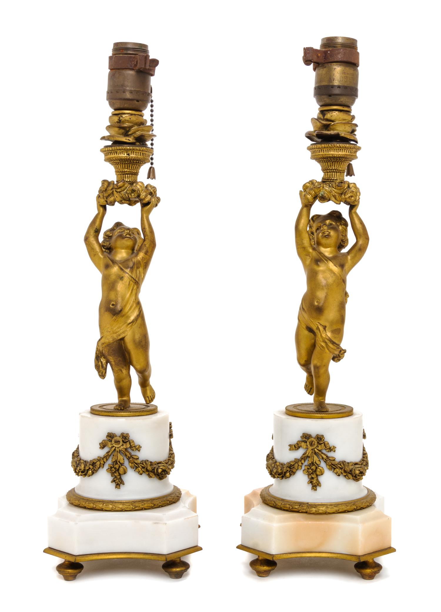 A Pair of Louis XVI Style Gilt Bronze and Marble Figural Lamps, Height 22 inches.