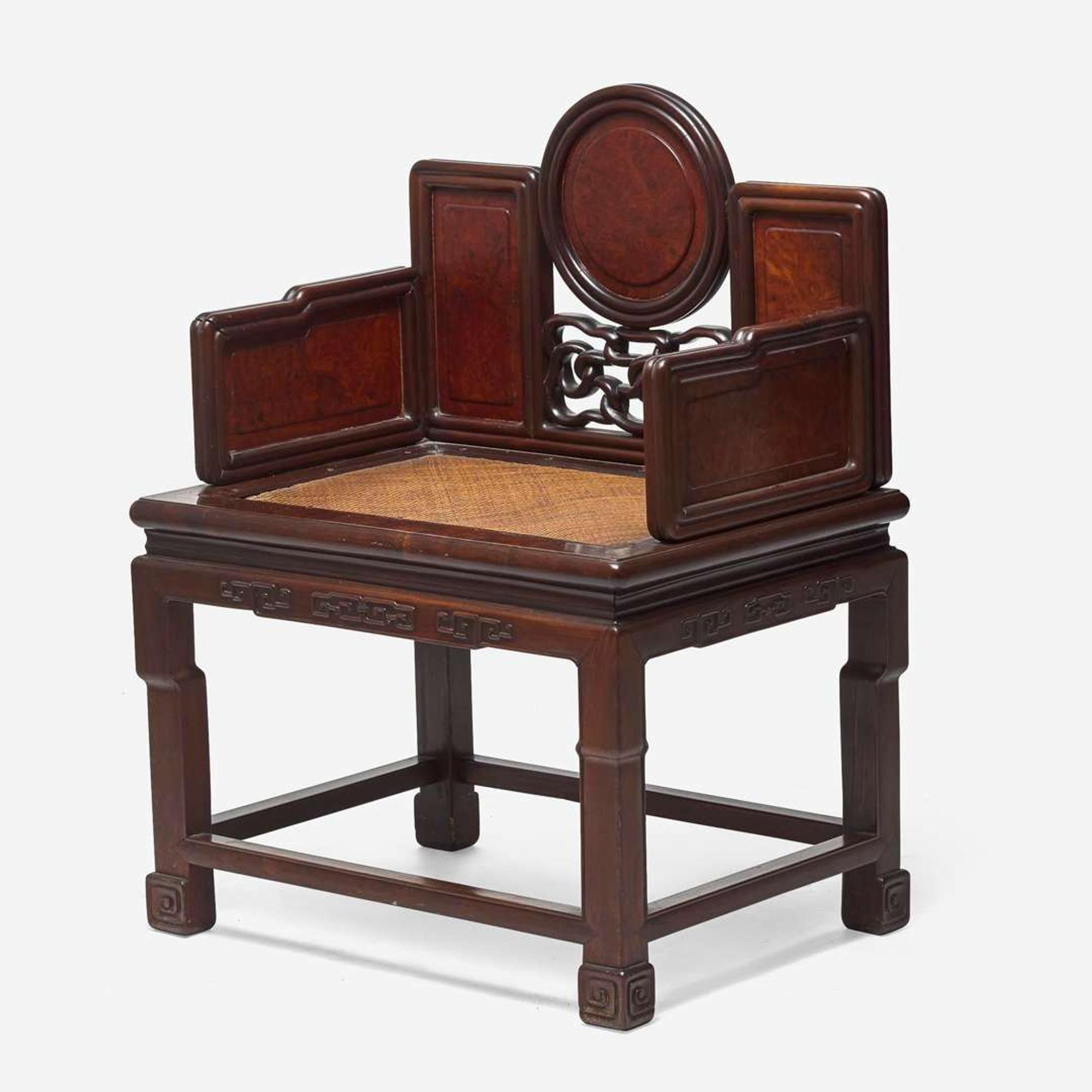 A Chinese carved hardwood and huamu armchair 硬木搭红木扶手椅一件 Late 19th/20th century ??????????