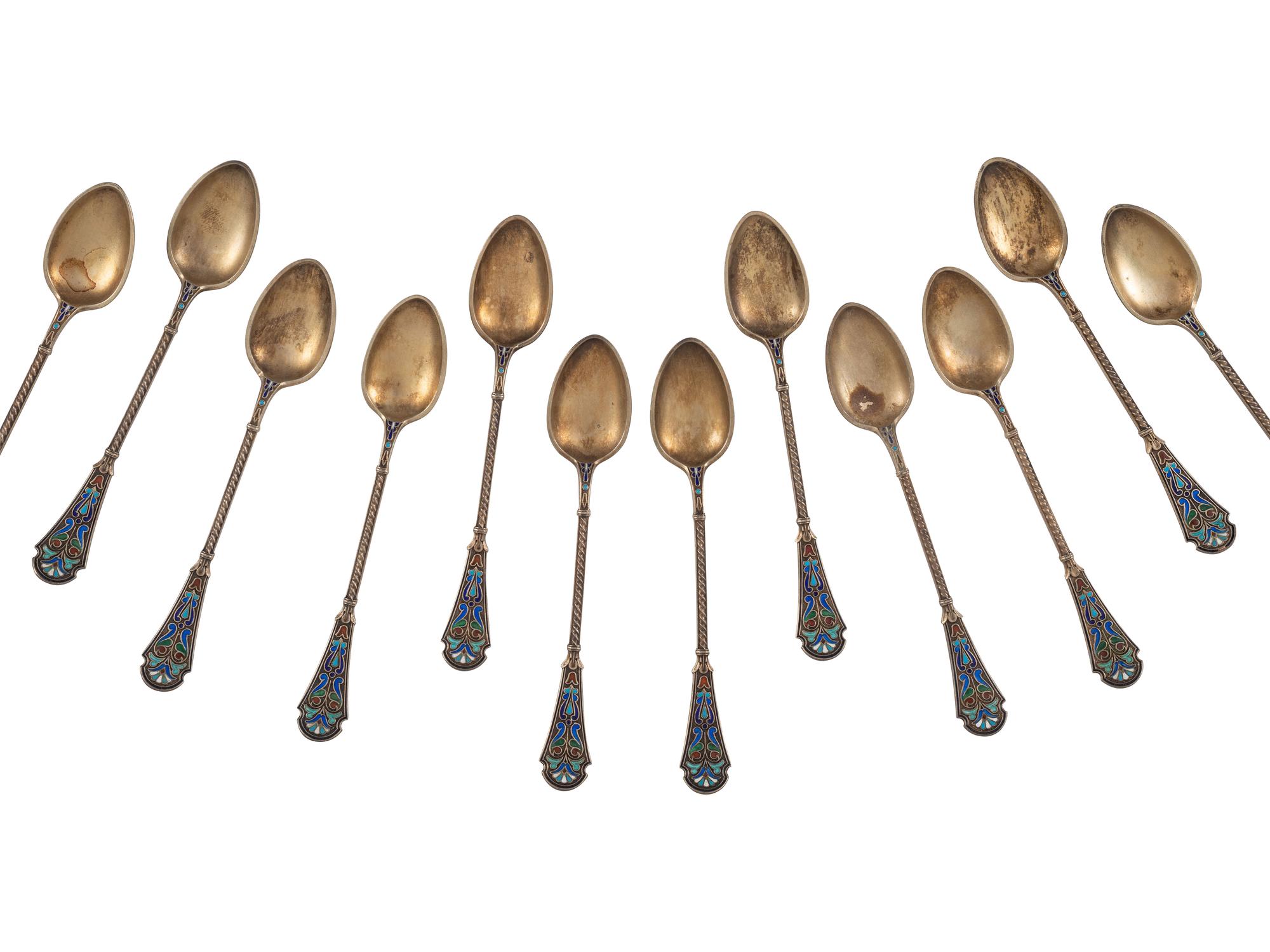 Thirty Russian Silver and Enamel Spoons and Forks