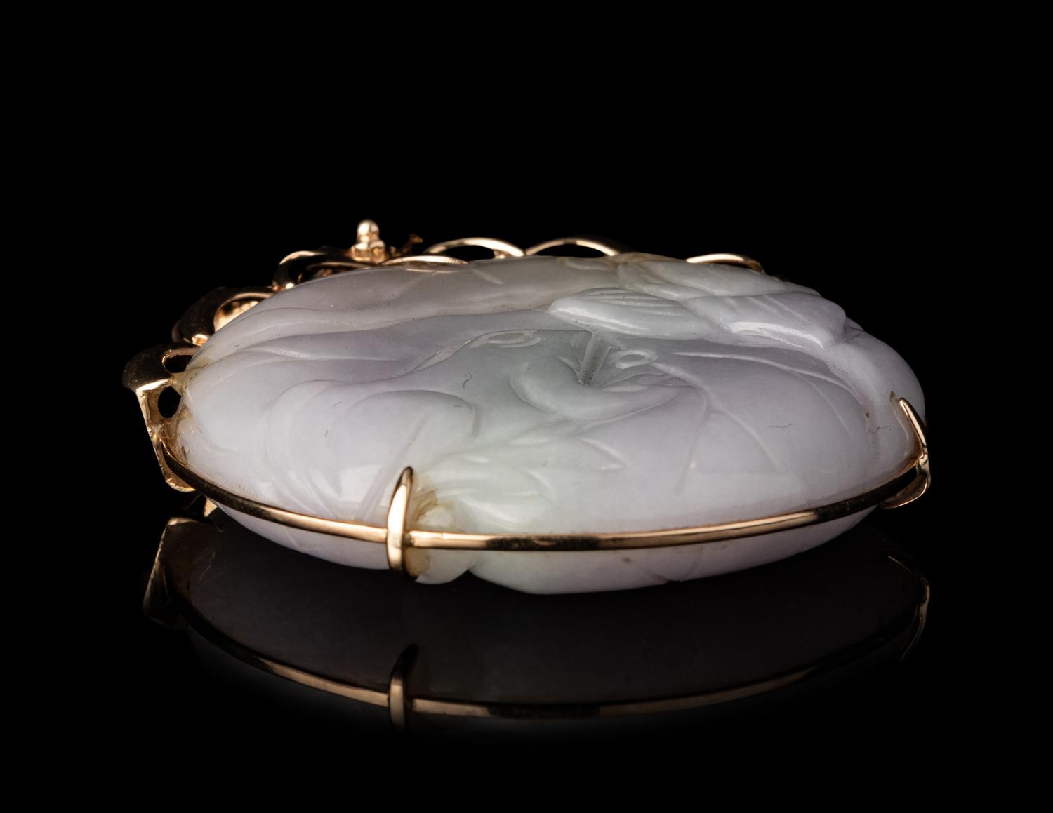 A Chinese Lavender Jadeite Pendant
