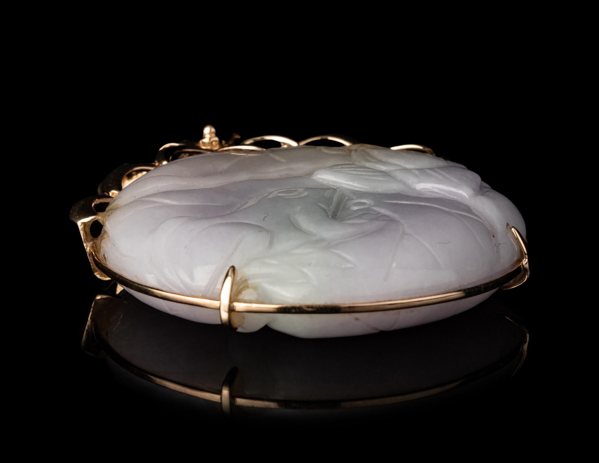 A Chinese Lavender Jadeite Pendant