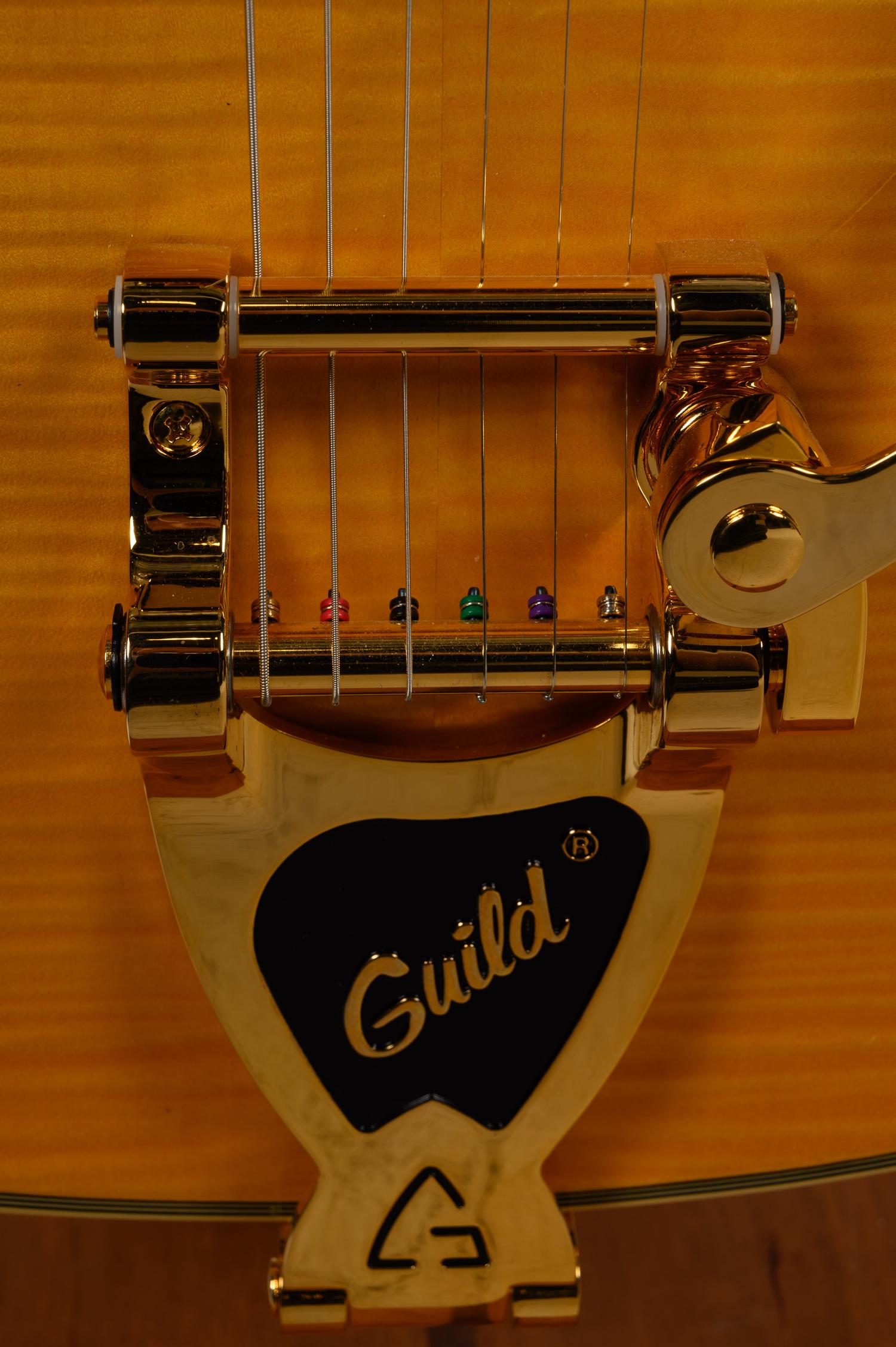 A Guild Tiger Maple and Mother-of-Pearl Inlaid Electric Blues Guitar