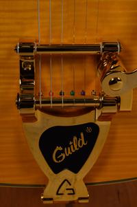 A Guild Tiger Maple and Mother-of-Pearl Inlaid Electric Blues Guitar