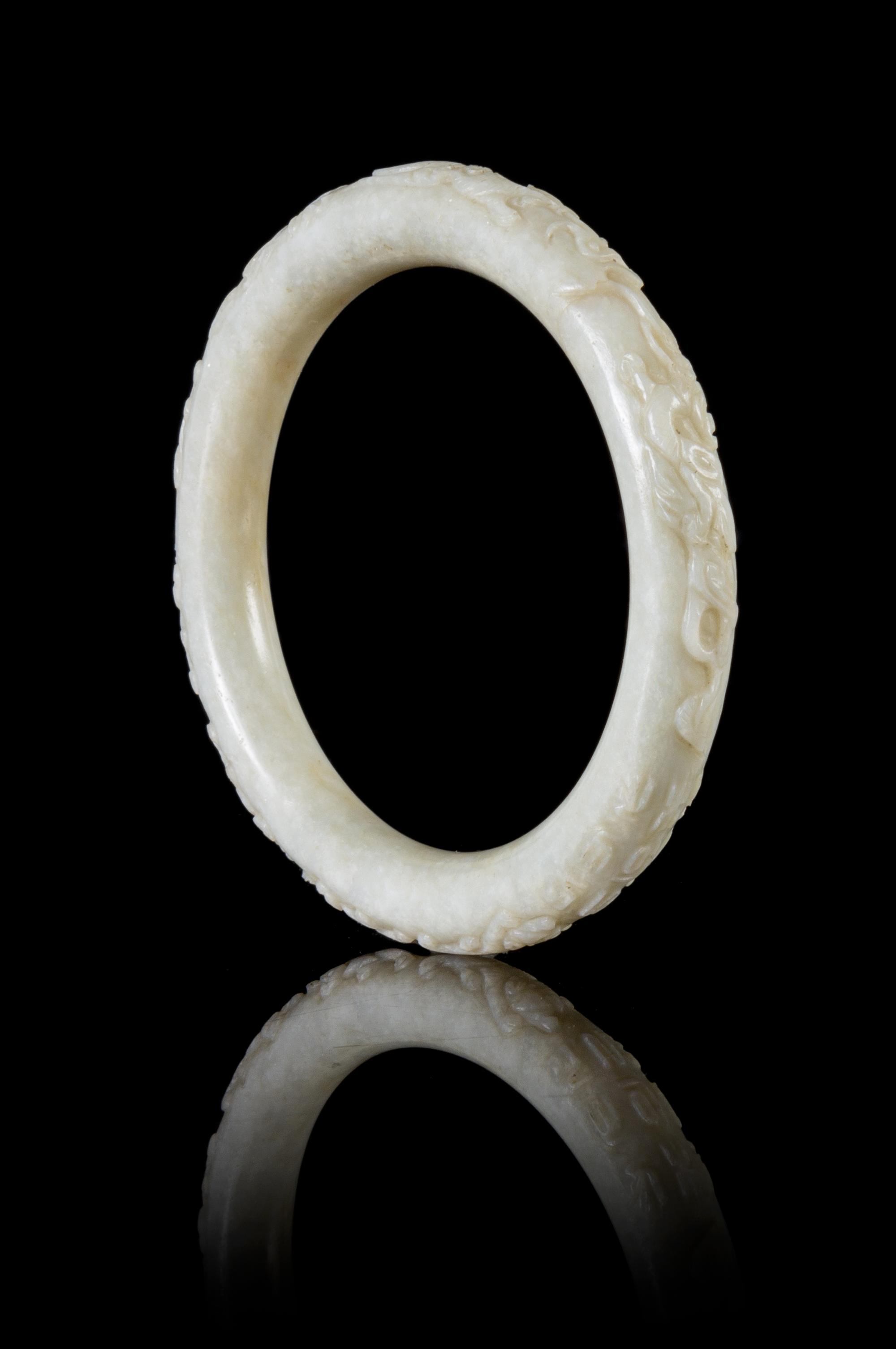 A White Jadeite Bangle Diameter 3 1/4 inches.