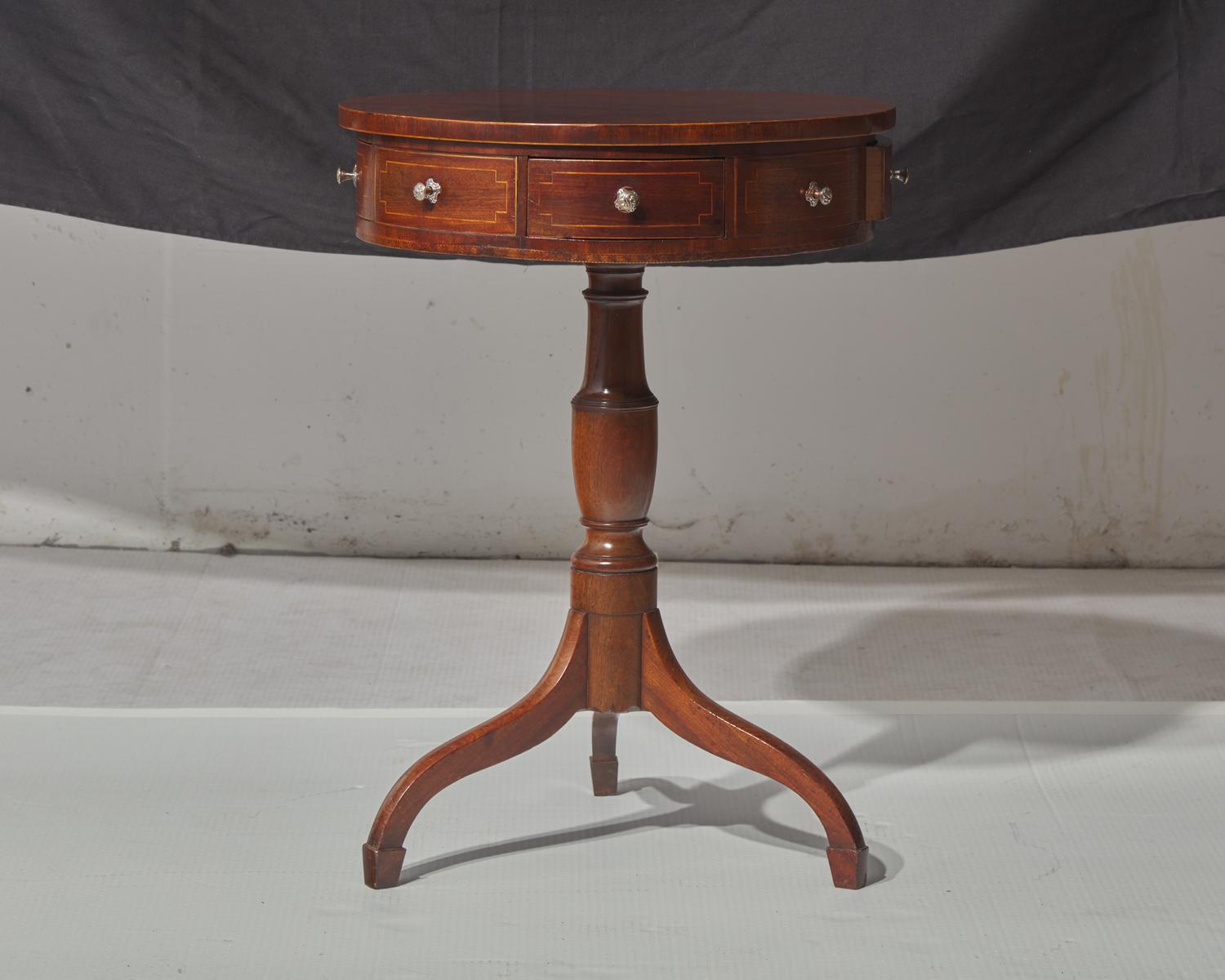A small Regency inlaid mahogany drum table, circa 1820