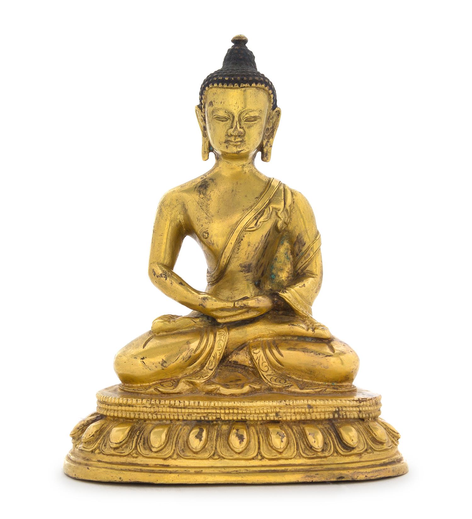 A Gilt Bronze Figure of Buddha Height 5 7/8 inches.