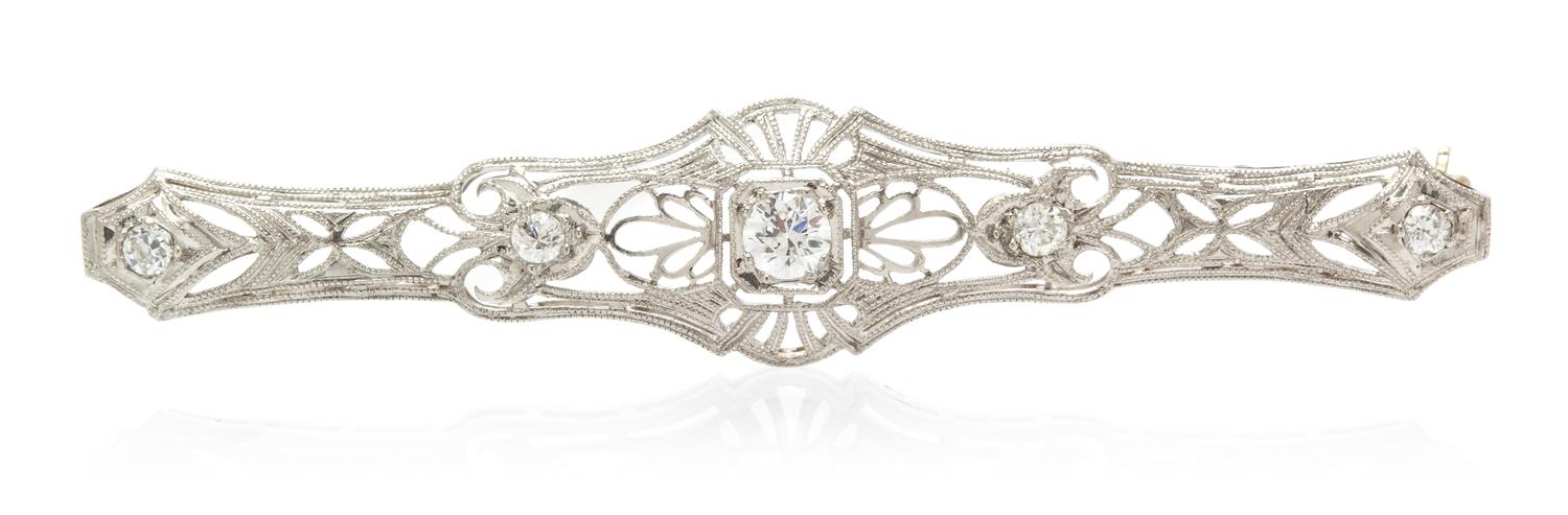 A Platinum, White Gold and Diamond Bar Brooch, 3.90 dwts.