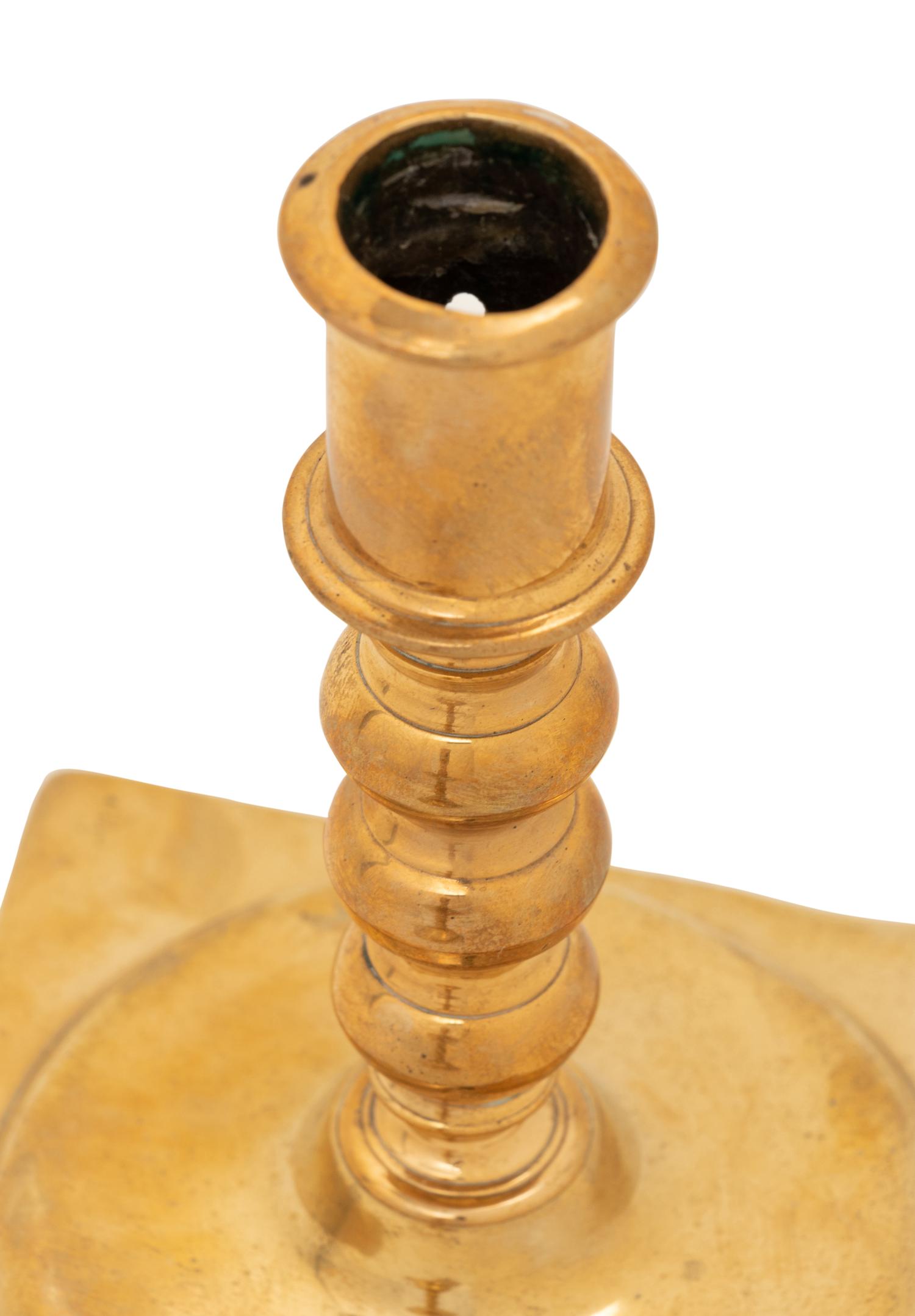 Two Continental Brass Candlesticks