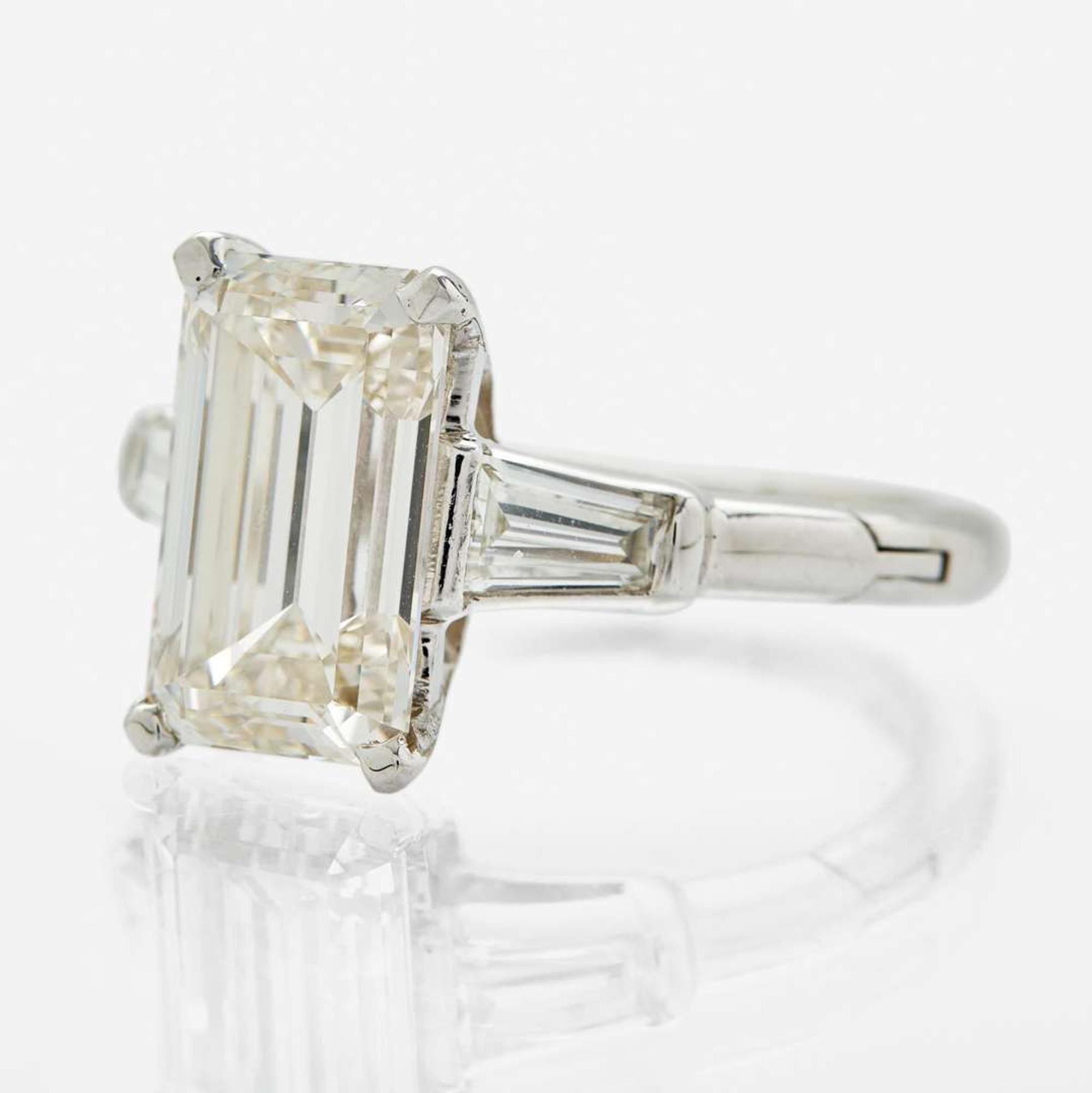 A Platinum and Diamond Ring 3.91 Emerald cut Diamond, GIA Certified