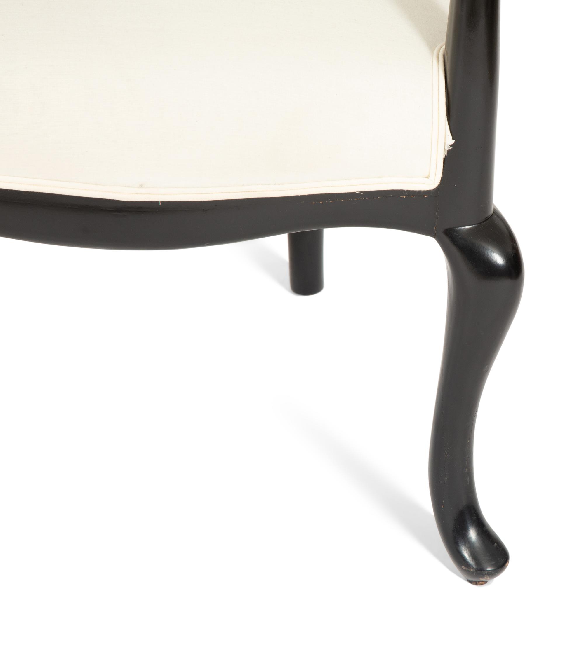 A Venetian Grotto Style Carved Black Lacquered Armchair