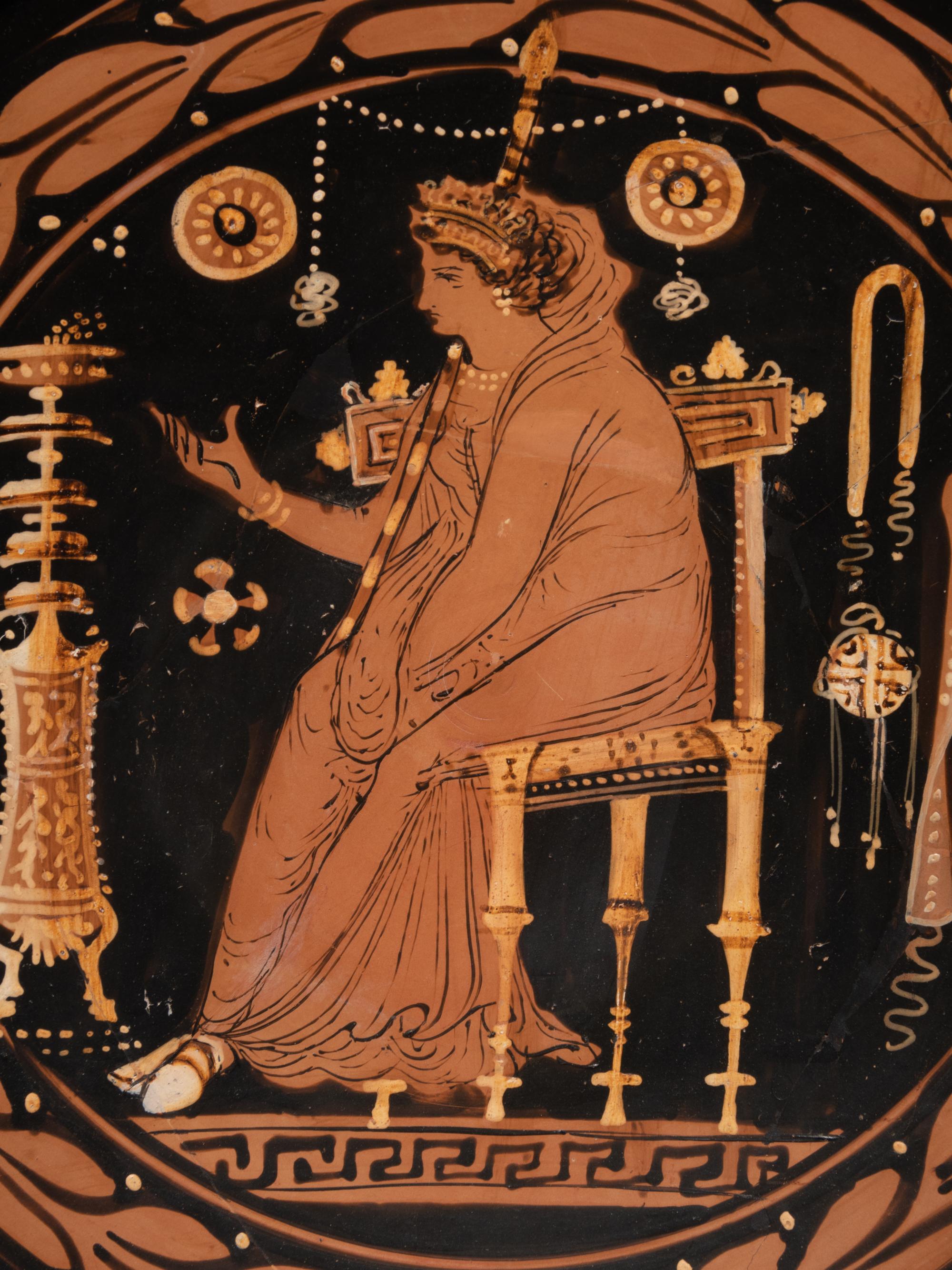 An Apulian Red-Figured Plate with a Seated Goddess or Priestess