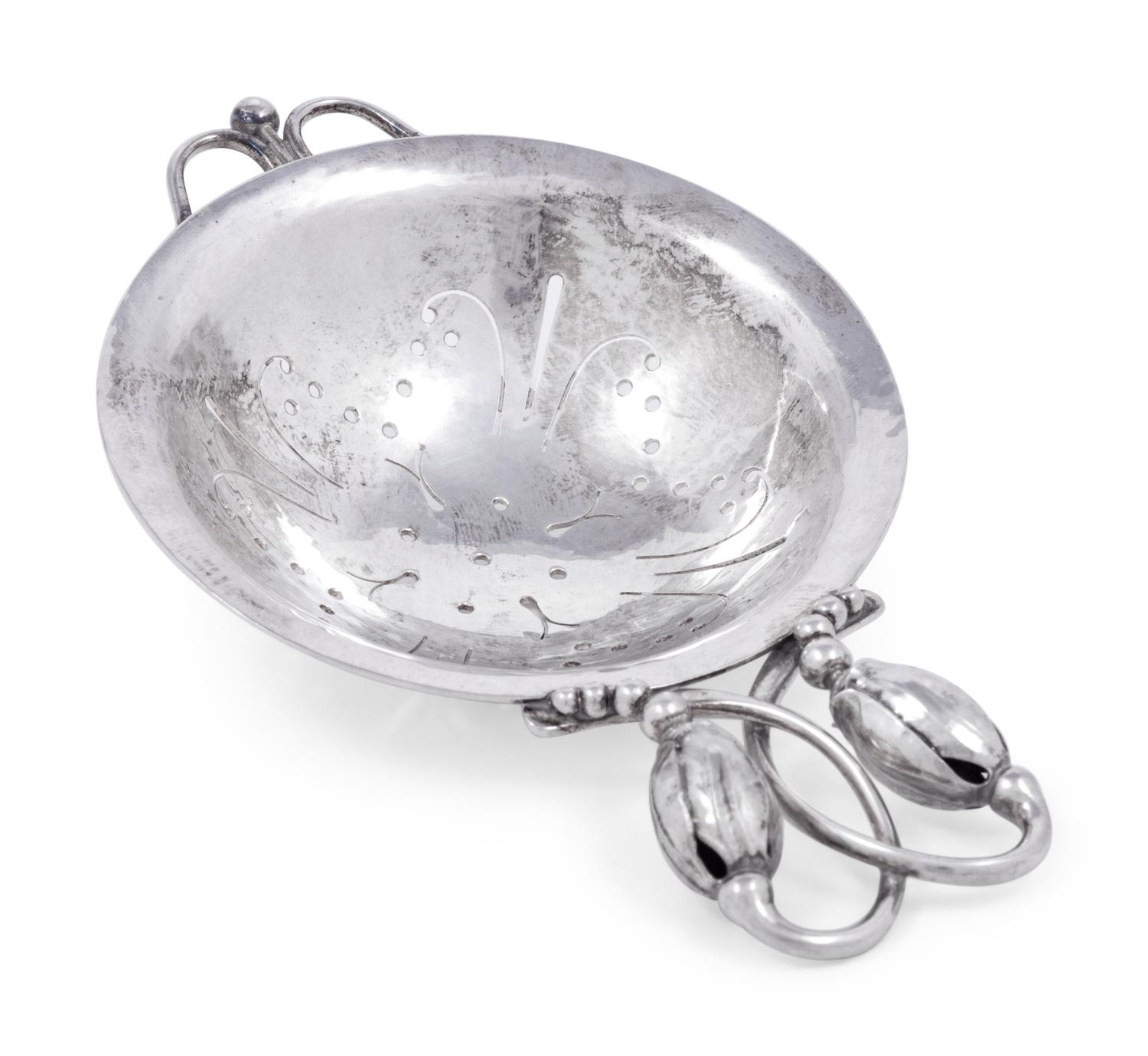 A Georg Jensen Silver Blossom Pattern Tea Strainer