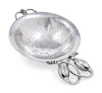 A Georg Jensen Silver Blossom Pattern Tea Strainer