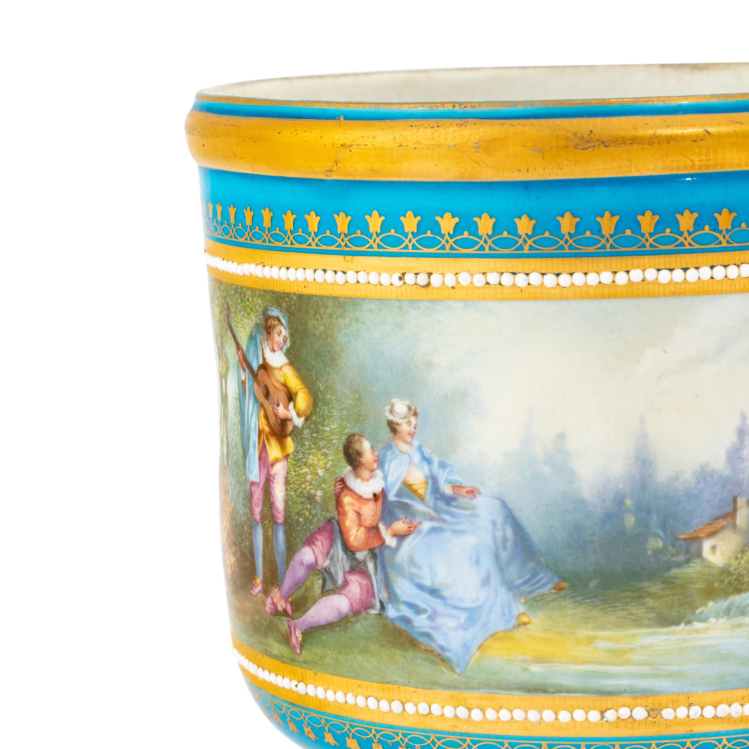 A Pair of Sèvres Style Porcelain Cache Pots