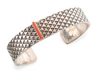 Heavily Stamped Silver Cuff Bracelet, set with a Slender Coral Sliver