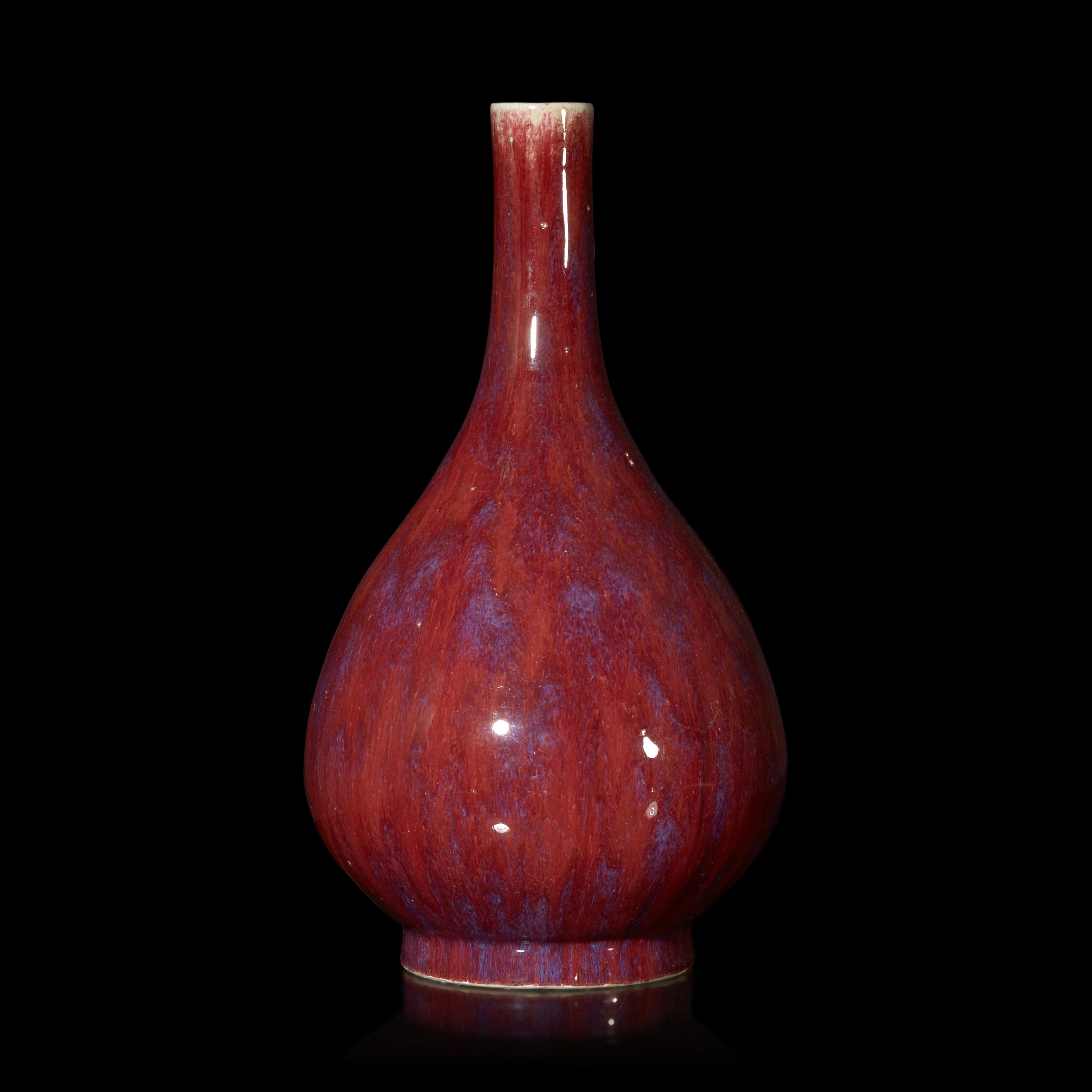 A Chinese Flambé Glazed Porcelain Bottle Vase, Qing Dynasty 清 窯變釉膽瓶