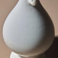 Two Chinese White Glazed Porcelain Vases, Qing Dynasty — 清 雙龍耳暗刻龍鳳紋白釉瓶及白釉四方小瓶