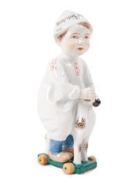 A Meissen Porcelain Figure of a Boy on a Pull Toy, by Konrad Hentschel