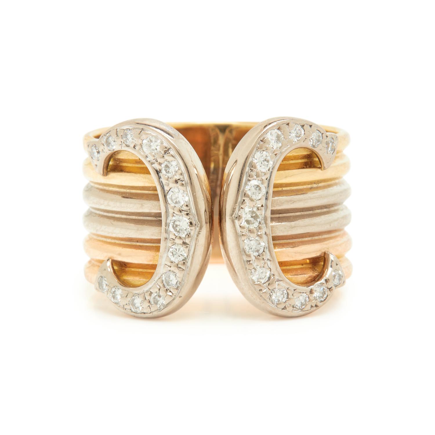 CARTIER, TRICOLOR GOLD AND DIAMOND 'C de CARTIER' RING