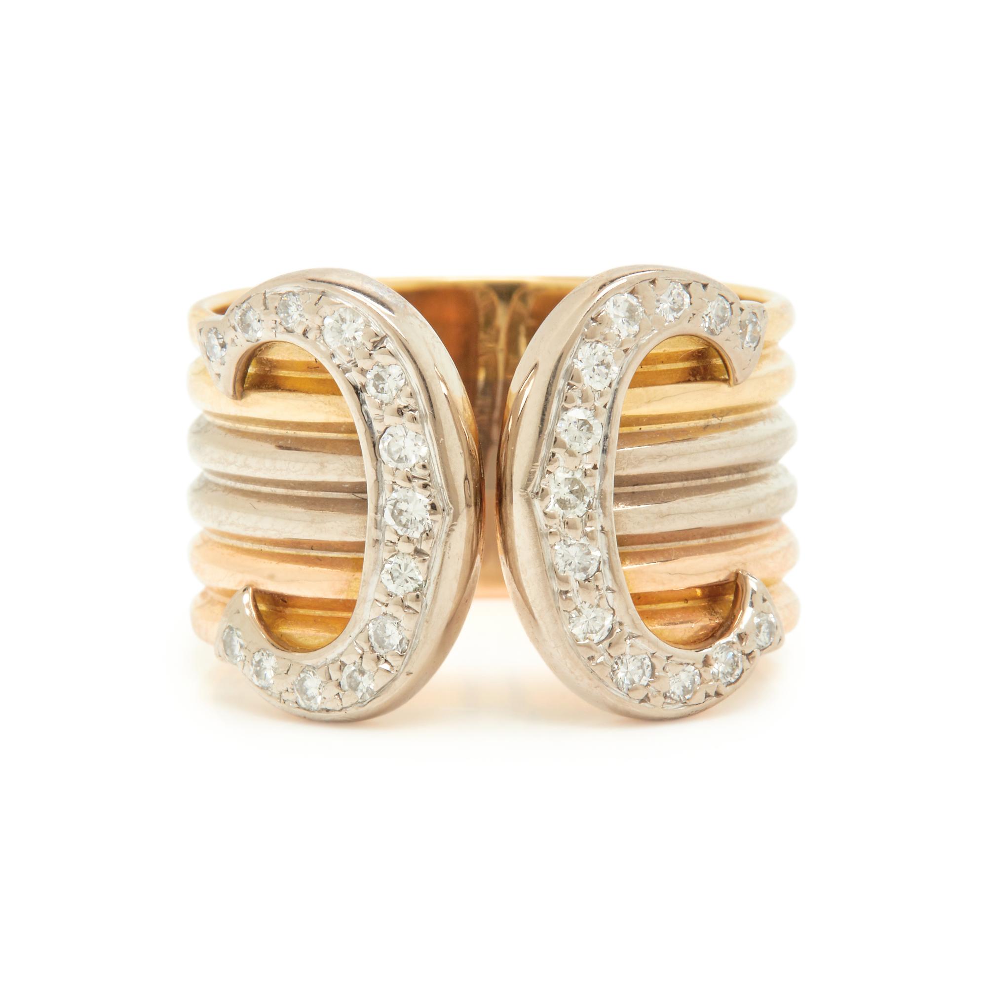 CARTIER, TRICOLOR GOLD AND DIAMOND 'C de CARTIER' RING