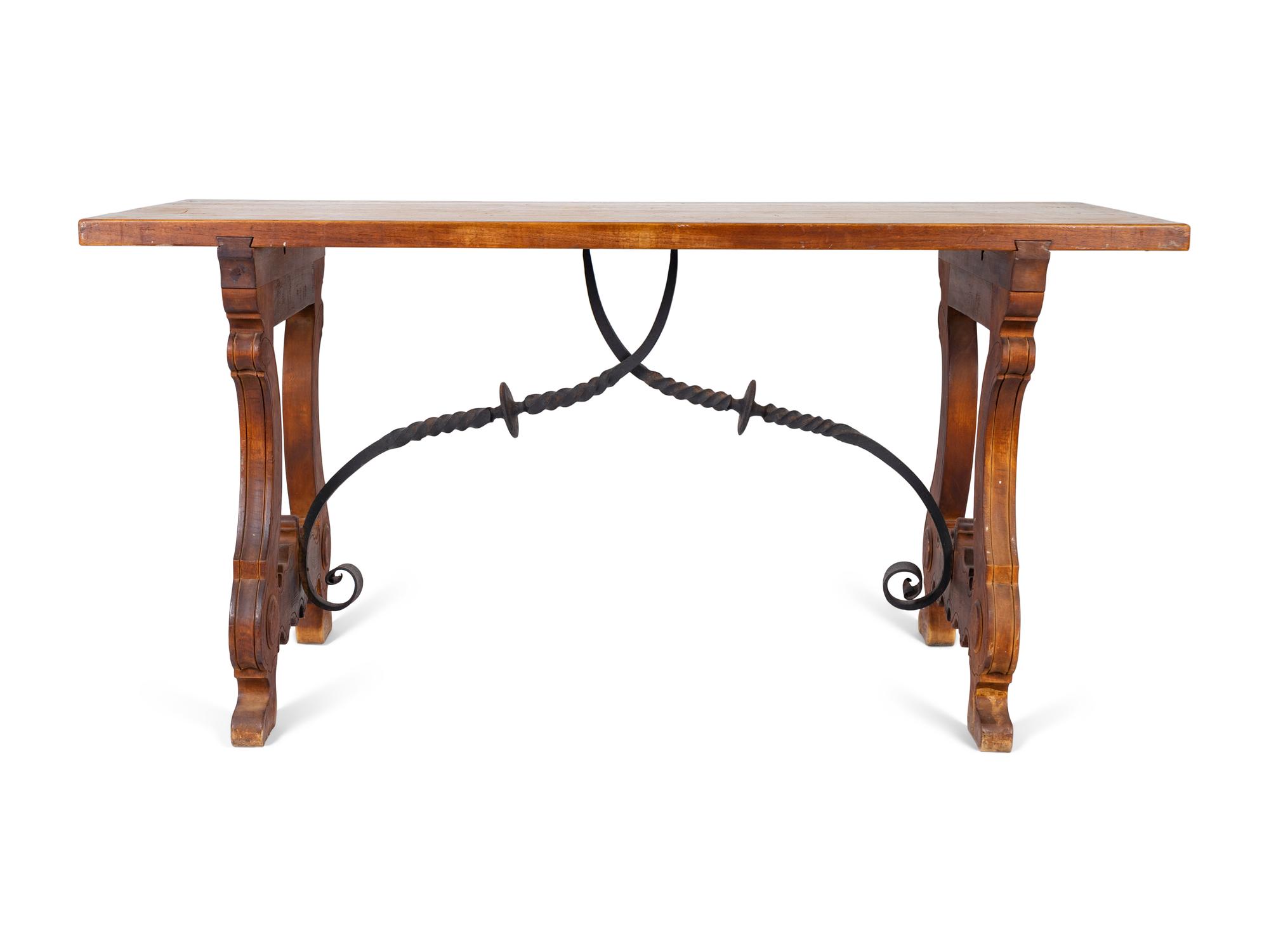 A Spanish Colonial Style Walnut Trestle Table with Wrought Iron Stretcher — 19TH CENTURY
