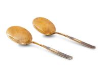 A Pair of Russian Niello Silver-Gilt Serving Spoons