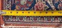 A Pair of Isfahan Silk Rugs