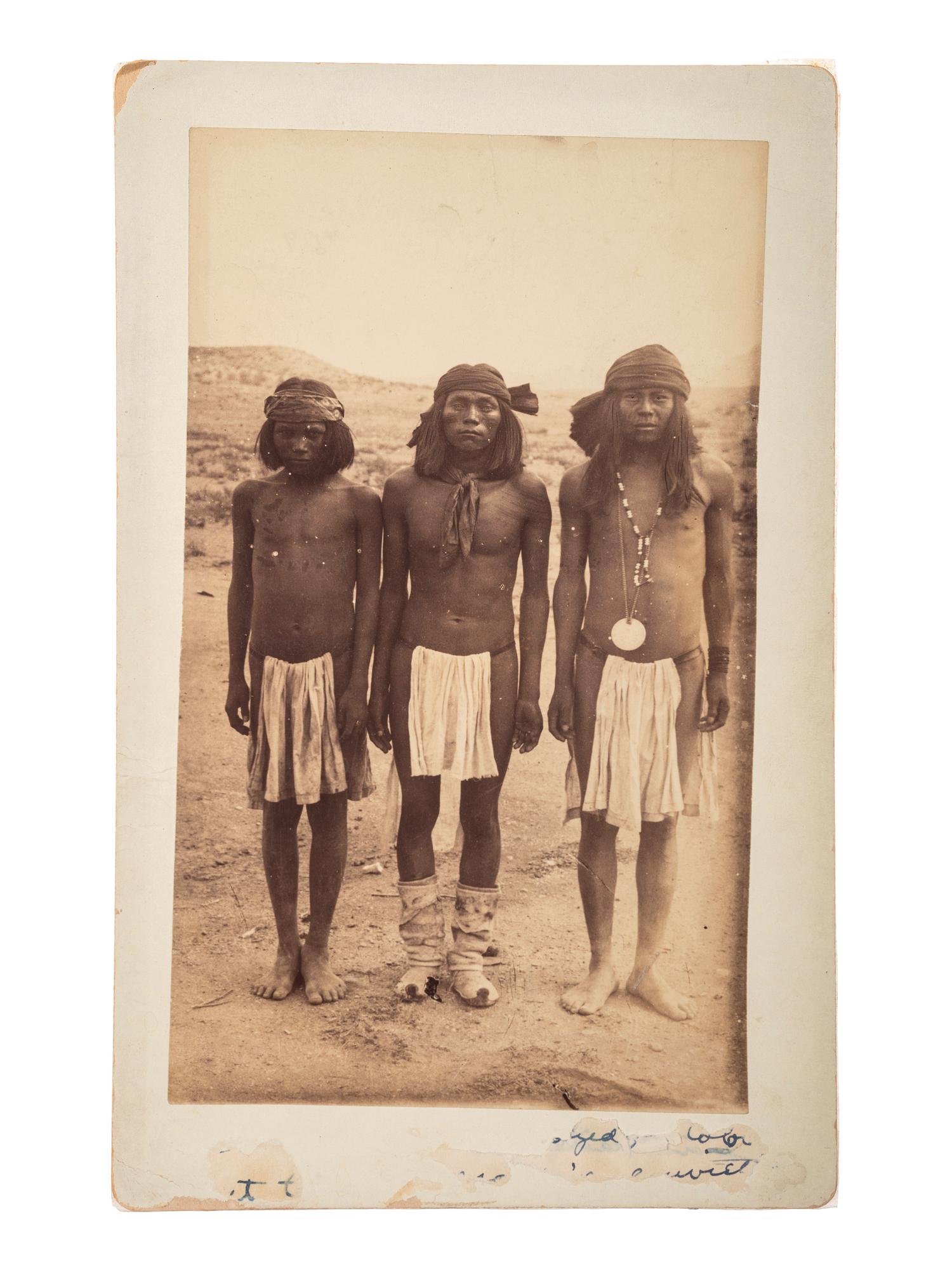 [NATIVE AMERICANS]. Boudoir card of three Apache men wearing loin cloths.