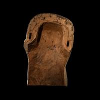 An Egyptian Painted Wood Sarcophagus Head