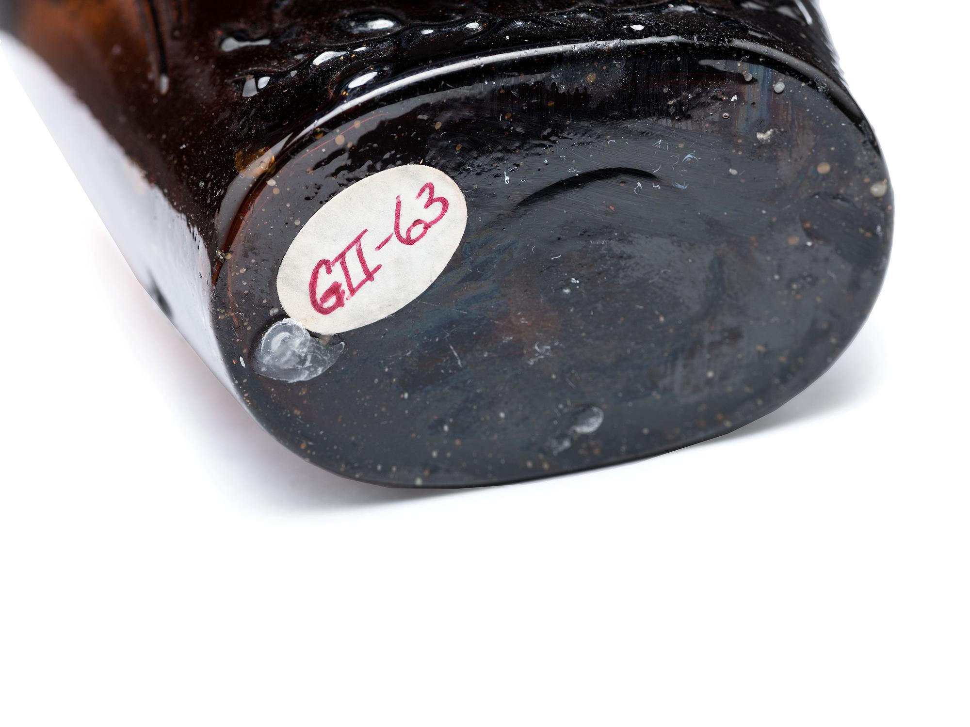 A Molded-Glass Flask in Amber by Willington Glass Company, Connecticut