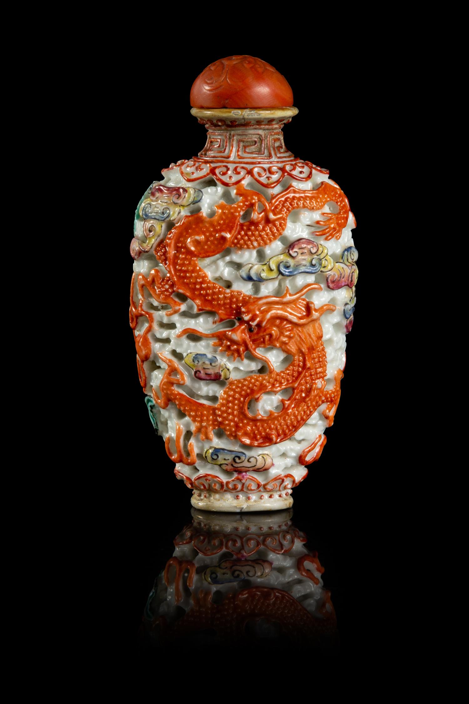 A Molded Iron-Red and Famille Rose Porcelain Snuff Bottle
