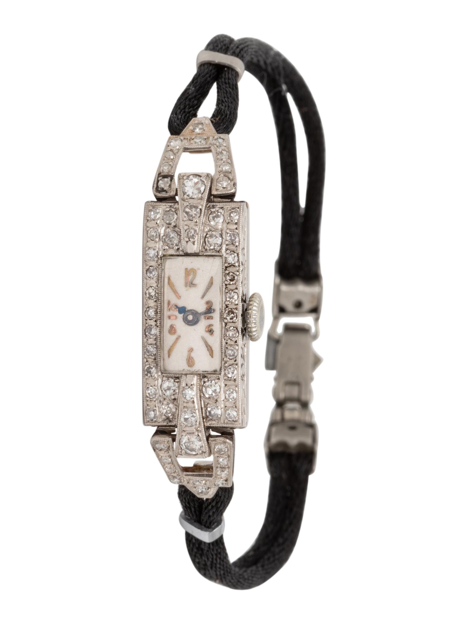 ANTIQUE, PLATINUM AND DIAMOND WATCH