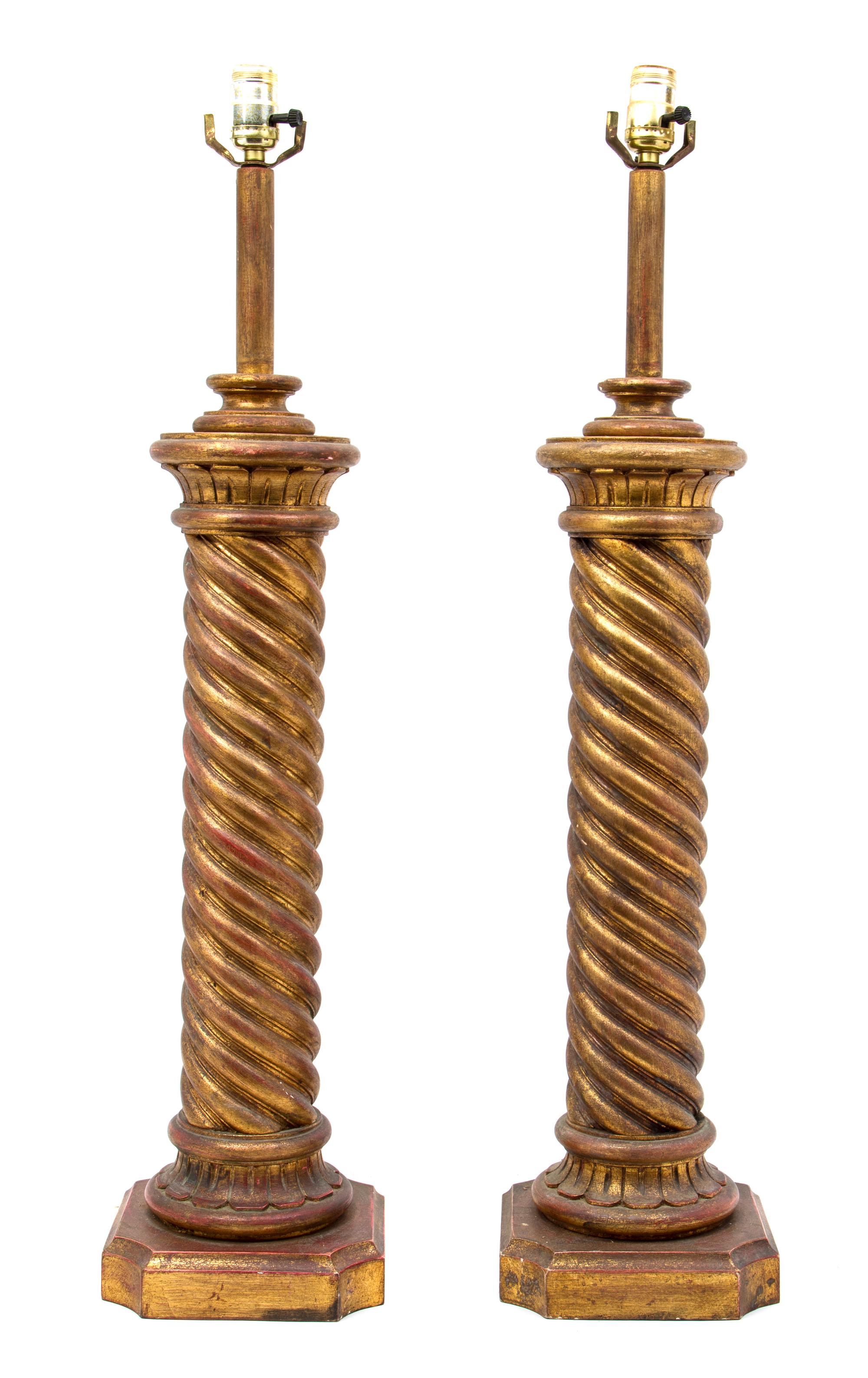 A Pair of Italian Turned Giltwood Lamps, Height overall 34 1/4 inches.